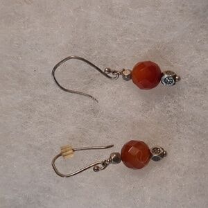 Redish orange gemstone possibly carnelian and sterling silver will test asap